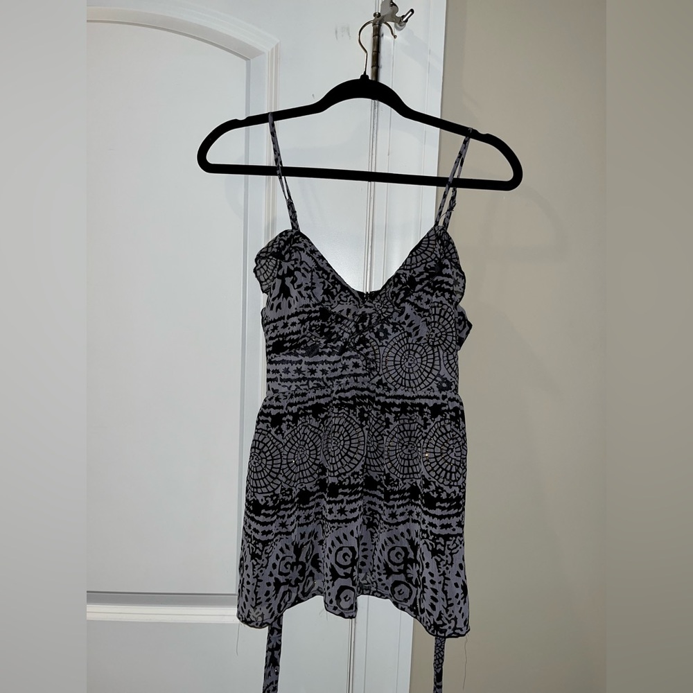 Cute, flowy, tank with tie in the back